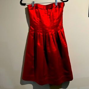 Beautiful Red Strapless BCBGMAXAZRIA dress. Like new, size 4!